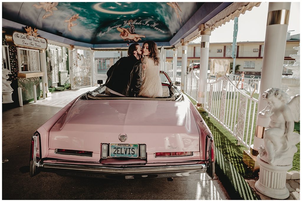 couple in pink car