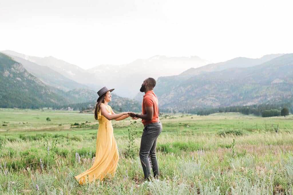 couple dancing in field