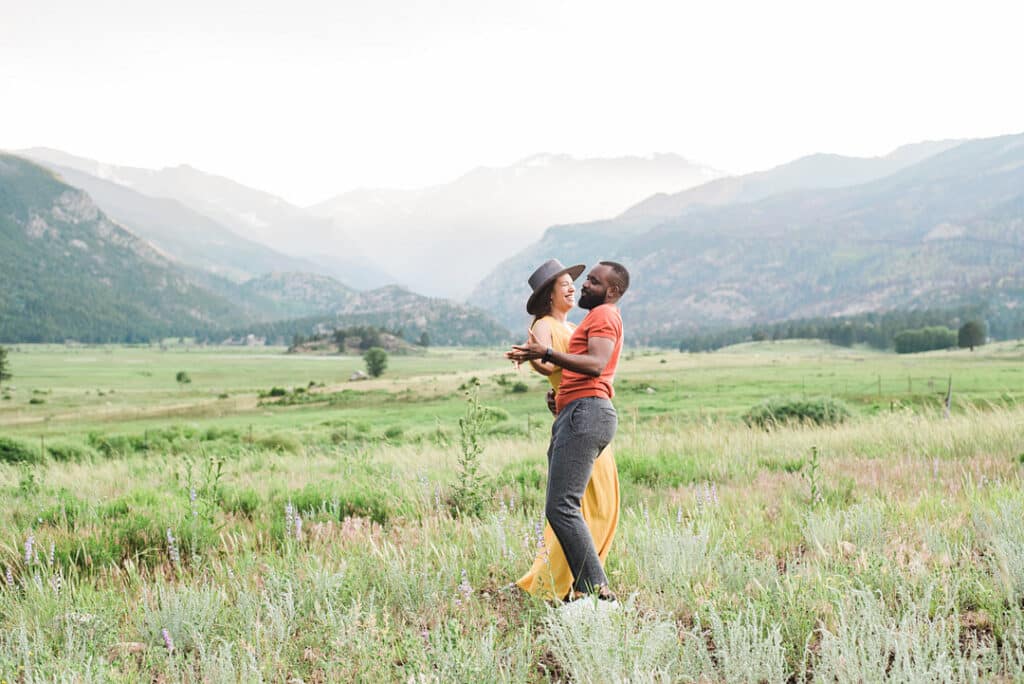 couple dancing in field