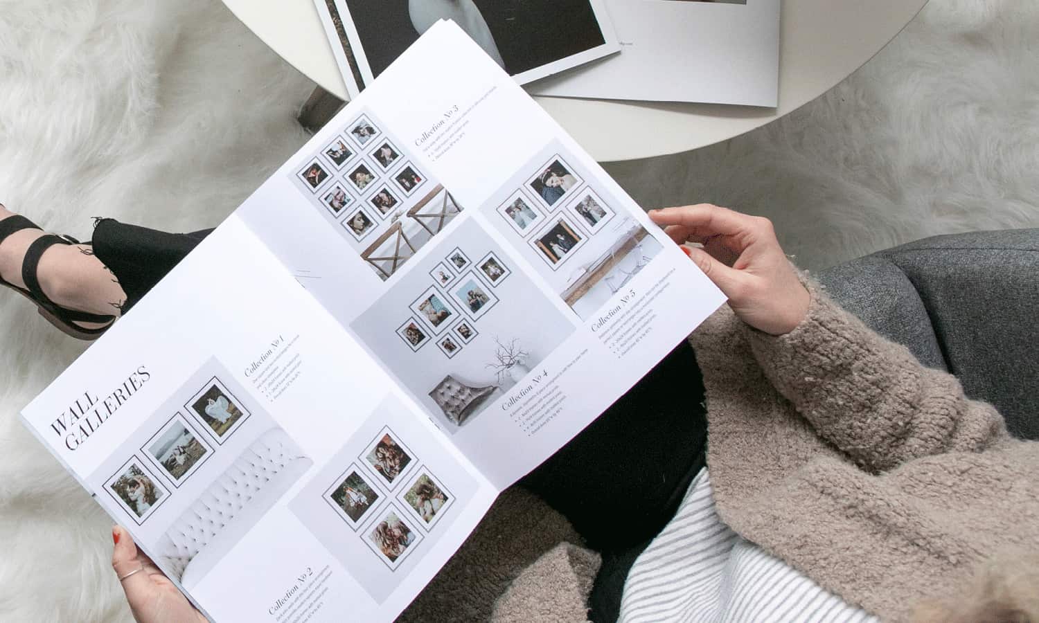 A Photography Lookbook by Design Aglow is shown here open on a client's lap.