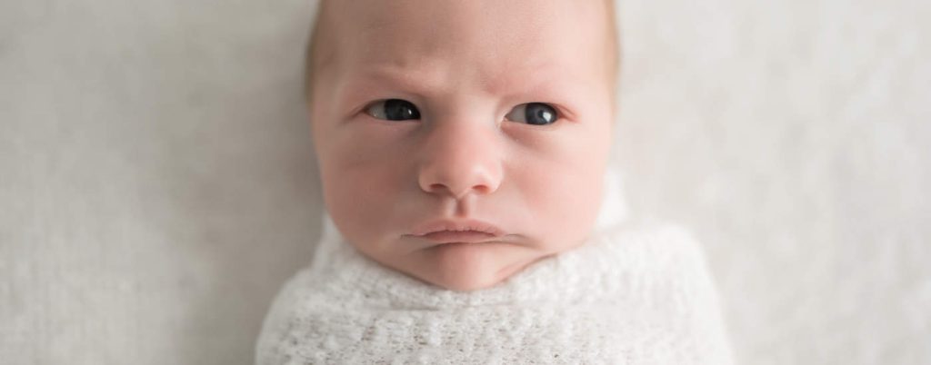 blogheader newborn posing