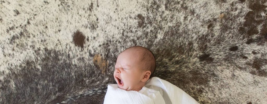 header blog newborn yawning
