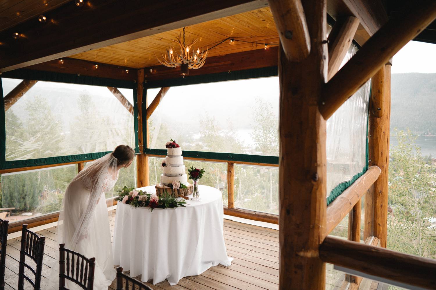 Customer Loyalty: By Nick Sparks, a bride bends forward to get a closer look at her wedding cake.