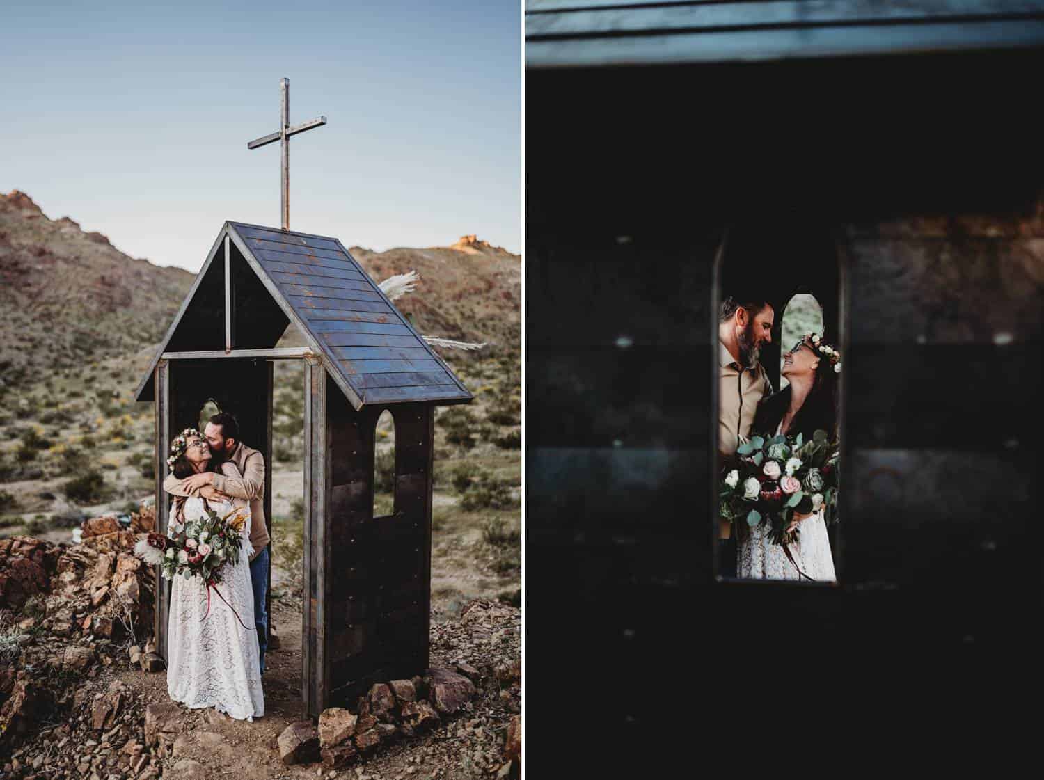 Two wedding photos are shown side by side. In the first one, a bride and groom cuddle close beneath the roof of a tiny wooden chapel in the mountains. In the second photo, the couple is photographed through the chapel's glassless window, where they look at each other lovingly.