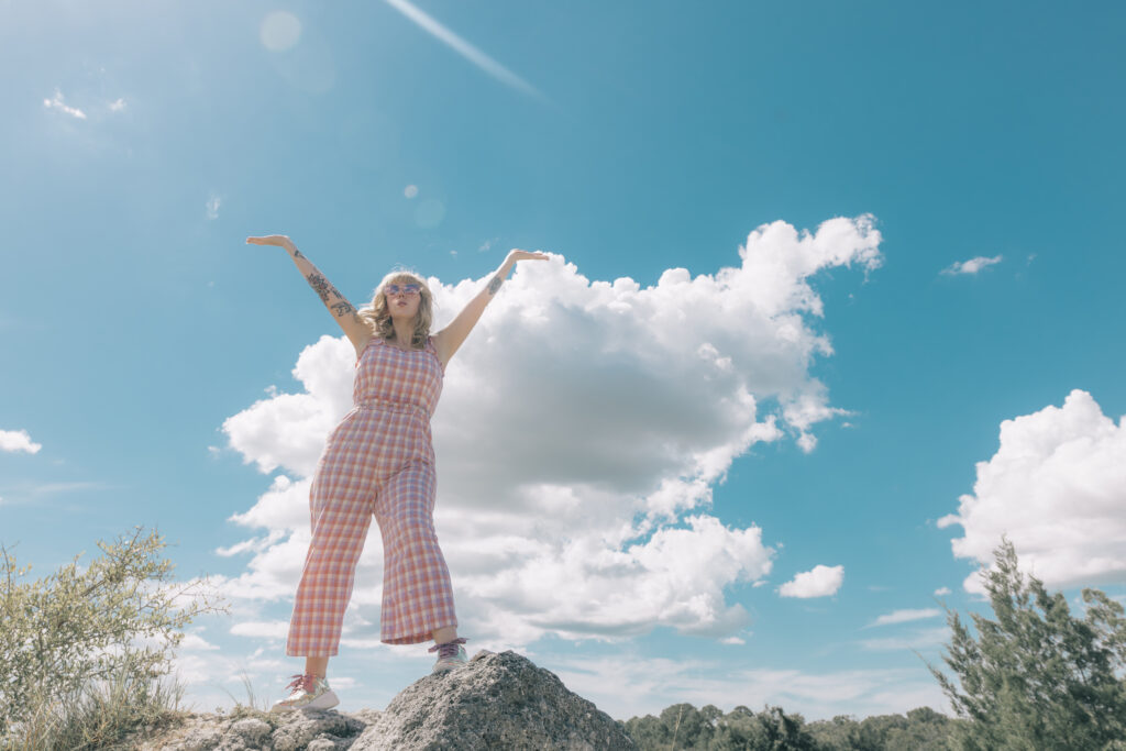 woman standing in front of cloud