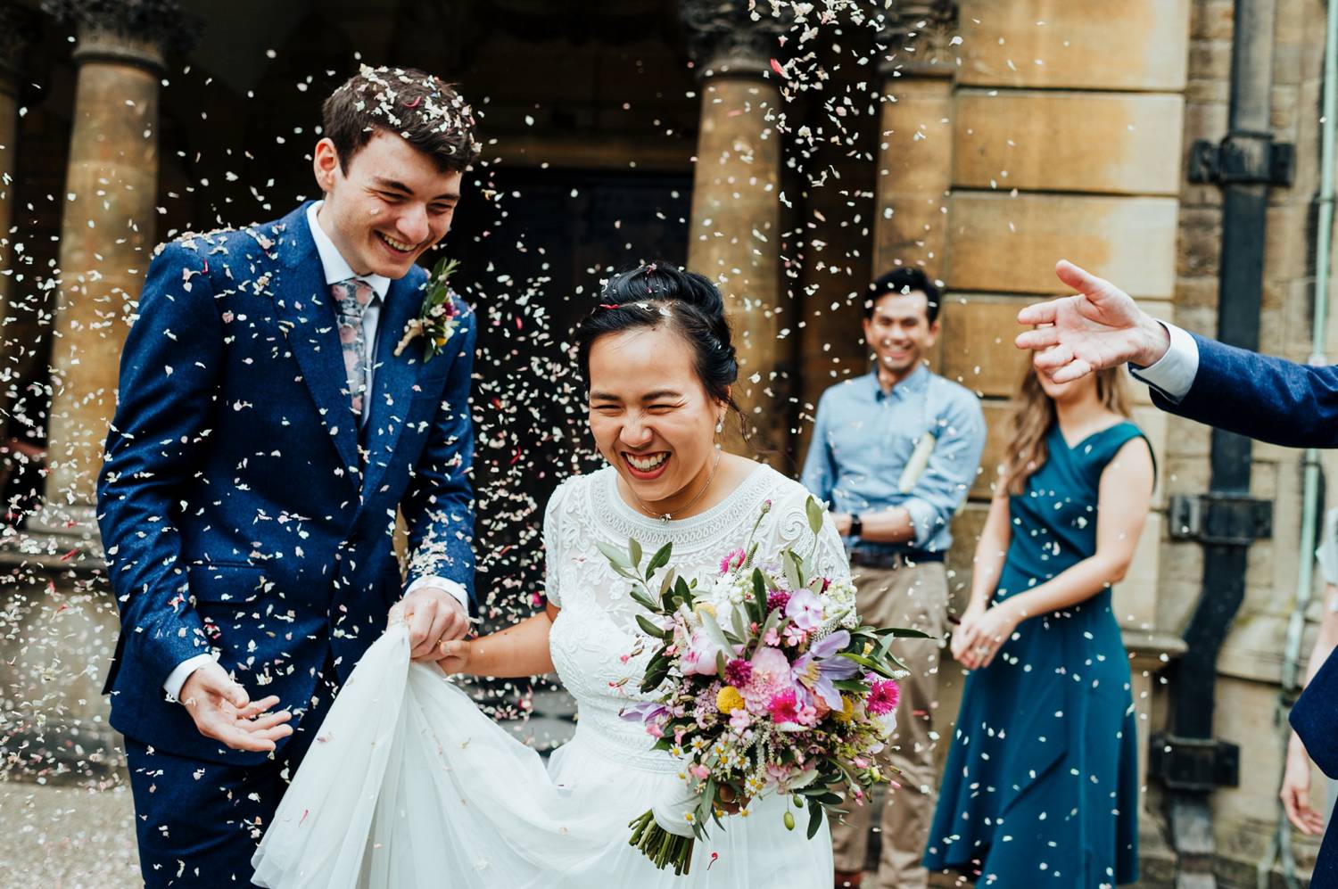 Bride and groom escape church under birdseed