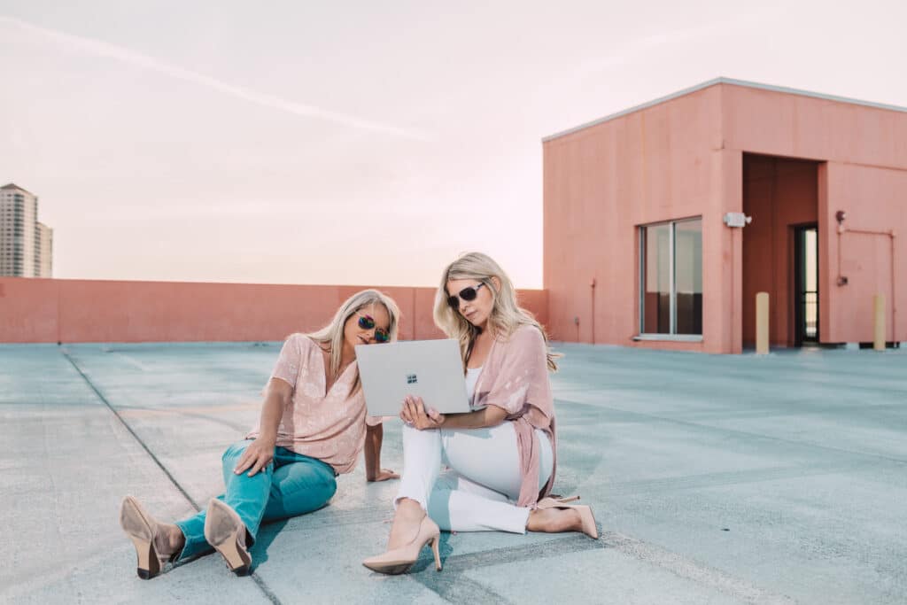 two women with laptop