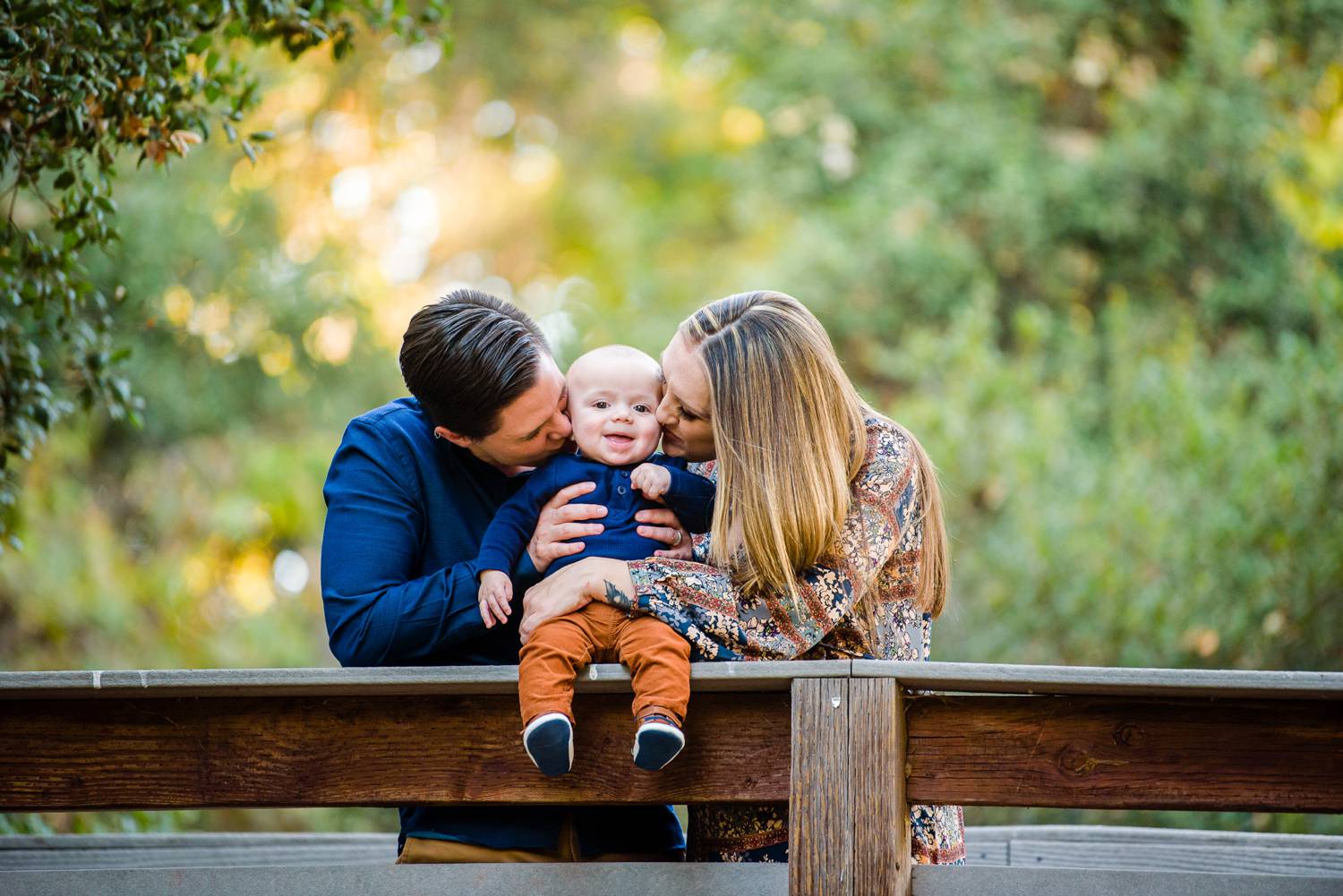 family portraits on a bridge