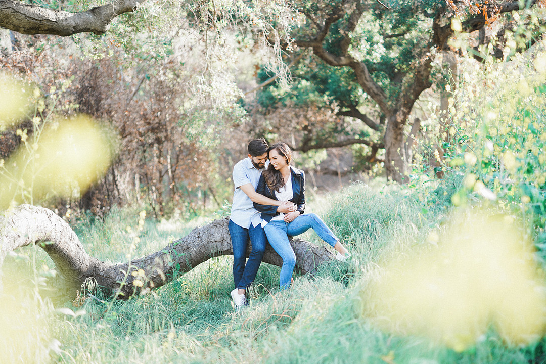 Engagement photo of couple in the woods