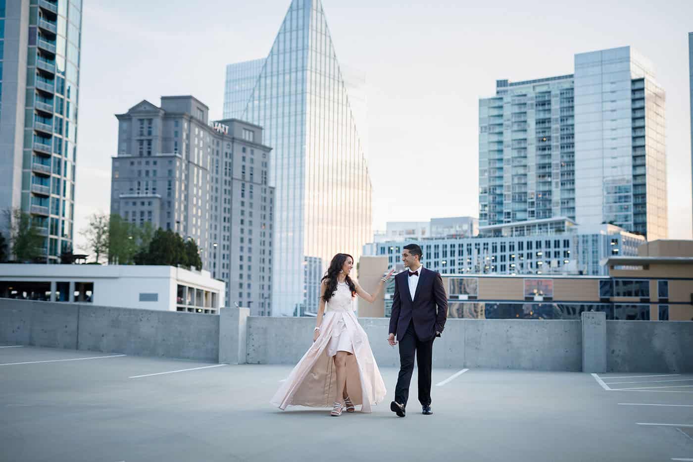 This is the Key to Amazing Client Relationships | A bride and groom stroll across the rooftop parking garage in the heart of downtown Atlanta.