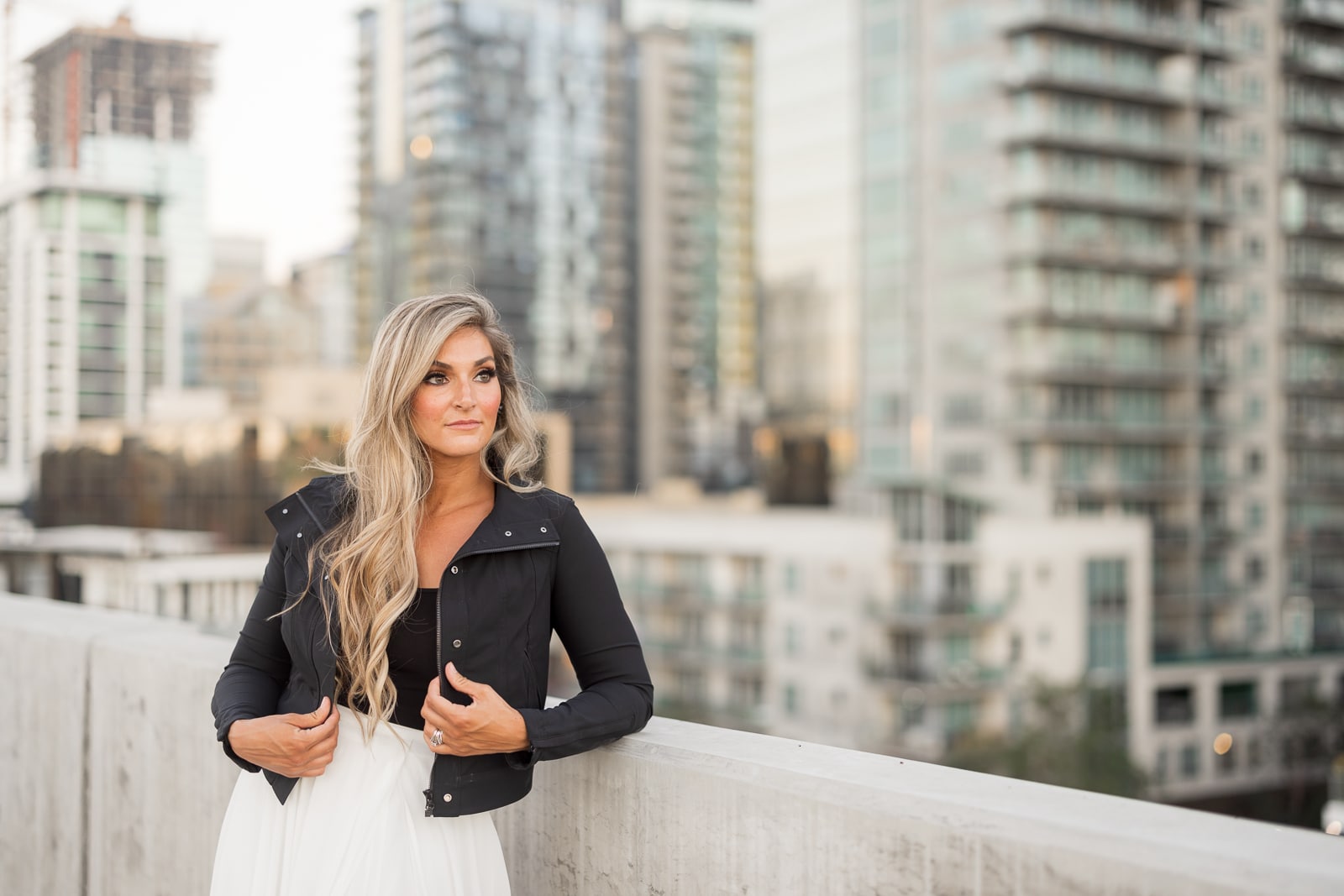 Lifestyle photo of woman outside in a city